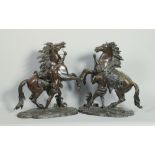 A pair of 19c patinated bronze Marley horses inscribed and after the original by Cuostou, 23h, 17w.