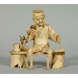 A Japanese Meiji period figure of a gentleman seated on a bench, a/f, 4.5w.