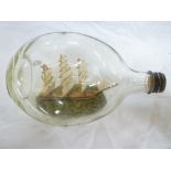 A ship-in-the-bottle model of a three-ma
