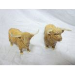 A Beswick china Highland Bull and Cow