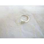 An 18ct white gold dress ring set two di