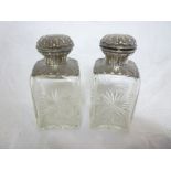 A pair of late Victorian cut glass silve