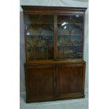 An early 19th century mahogany bookcase