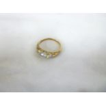 An 18ct gold engagement ring with scroll