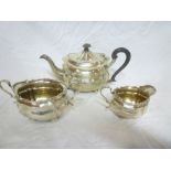 A George V silver three-piece teaset com