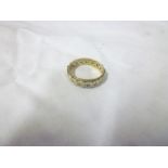 A 9ct gold and silver mounted eternity-s