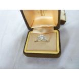 A 14ct white gold engagement ring set th