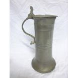 An 18th century pewter tapered ale jug w