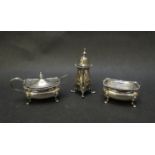 Three silver cruets including pepperette and salt,