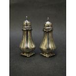 A pair of Tiffany & Co silver pepperettes,