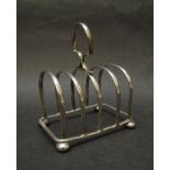 A Robert Chandler silver five bar toast rack,