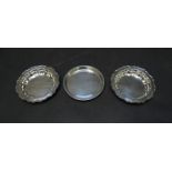 A pair of William Bush & Sons silver pin dishes, shaped edge, Sheffield 1946,