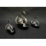 A pair of silver and blue glass swan salts,