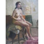 A framed oil on canvas laid on to board of a seated female nude in a studio interior.