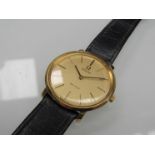 OMEGA: A gold plated and steel De Ville manual wind gents wristwatch with gilded dial,