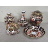 Five pieces of Royal Crown Derby Old Imari pattern ceramics, various dates including two posy vases,