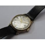 GARRARD: A gold cased gent's automatic wristwatch circa 1960's/70, with date aperture,