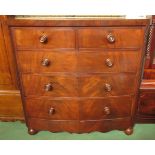 Circa 1840 a mahogany bow front chest of two short over three graduating long drawers with carved