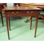 Circa 1780 an oak side table the single frieze drawer over square tapering legs