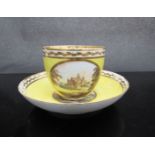 A Derby named view teacup and saucer, painted by George Robertson, the cup with Hathorenden,