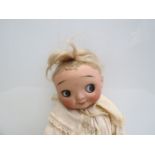 A bisque head Heubach Einco 6 googly eye doll, composition body,