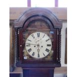 A 19th Century mahogany and satin inlaid longcase clock with painted arch dial with Roman numerals