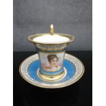 A circa 1900 Sevres portrait and turquoise and gilt cup and saucer,