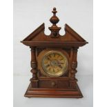 An early 20th Century mahogany mantel clock of architectural form,