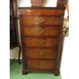 A George III flame mahogany with ebony inlay tall chest of five graduating drawers flanked by