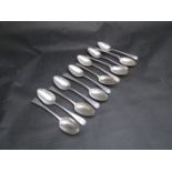 Twelve silver dessert spoons, all monogrammed WMJ,