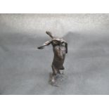 A limited edition bronze of a hare standing on hind legs 114/150,