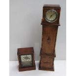 An American mahogany cased alarm clock and an oak cased miniature longcase clock with silvered