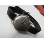WEBCO: A steel cased gent's wristwatch with grey Arabic dial, subsidiary seconds, case pitted,