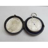 A silver cased small pocket aneroid barometer with silvered dial,