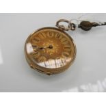 A late 19th Century lady's fob watch marked 18K, engraved dial with cartouche Roman numerals,