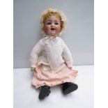 A 19" tall Simon & Halbig K star bisque headed doll, sleepy blue eyes,