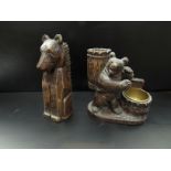 A Black Forest bear as a spill vase and a similar example as a clothes brush (2)