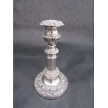 A Thomas Blagdon and Co, silver telescopic candlestick with embossed decoration, Sheffield 1823,