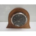 A Smith's dashboard clock with black dial and white painted Arabic numerals, in oak fitted case, 13.