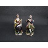 A pair of early 19th Century Derby figures of seated musicians, circa 1825, 16cm high,
