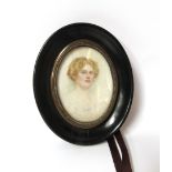 A late 19th early 20th Century hand painted portrait of a lady on ivory, ebonised surround, 7.5 x 5.