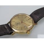 OMEGA: An 18ct gold manual wind gent's wristwatch with gilded dial,