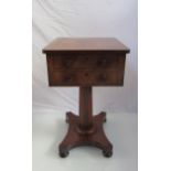 Circa 1820 a flamed mahogany work table the rounded circular top over two drawers,