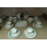 A quantity of Shelley Art Deco "Bands and Lines" in green tea wares, including teapot,