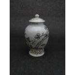 A Chinese Qianlong period (1736-95) grisaille tea caddy and cover,