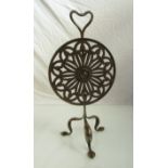 In the manner of "Christopher Dresser" an Arts and Crafts steel fire screen