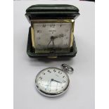 A boxed Swiza travel clock and a Pilot base metal pocket watch