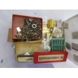 A box of watch materials, parts and spares,