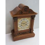 A late 19th/early 20th Century German mahogany mantel clock of architectural form,