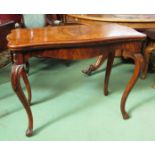 Circa 1840 an inlaid burr walnut serpentine edged card table,